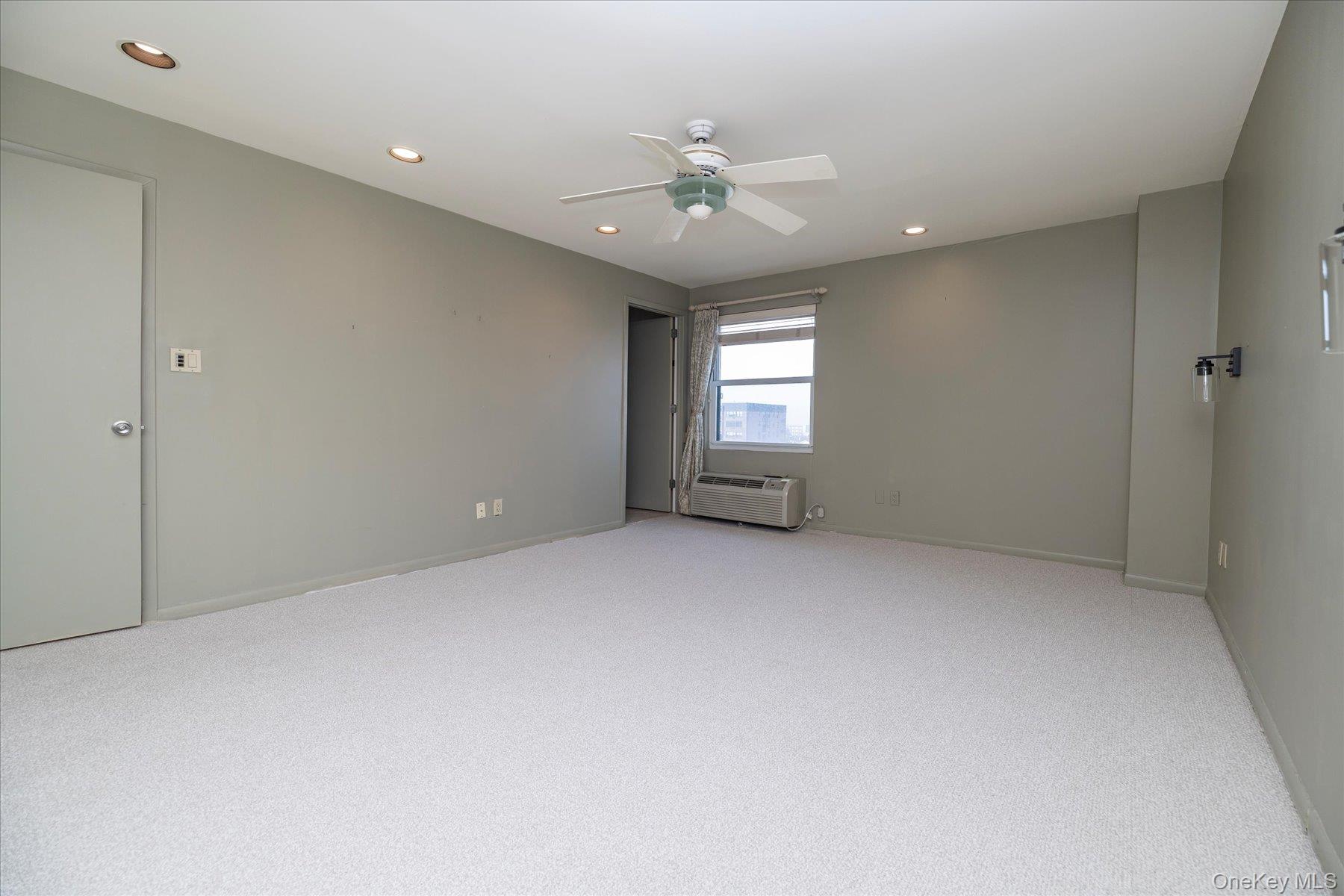 360 Shore Road, Unit 6L & 6M Long Beach, NY 11561 - Photo 20 of 28 a view of an empty room with a window