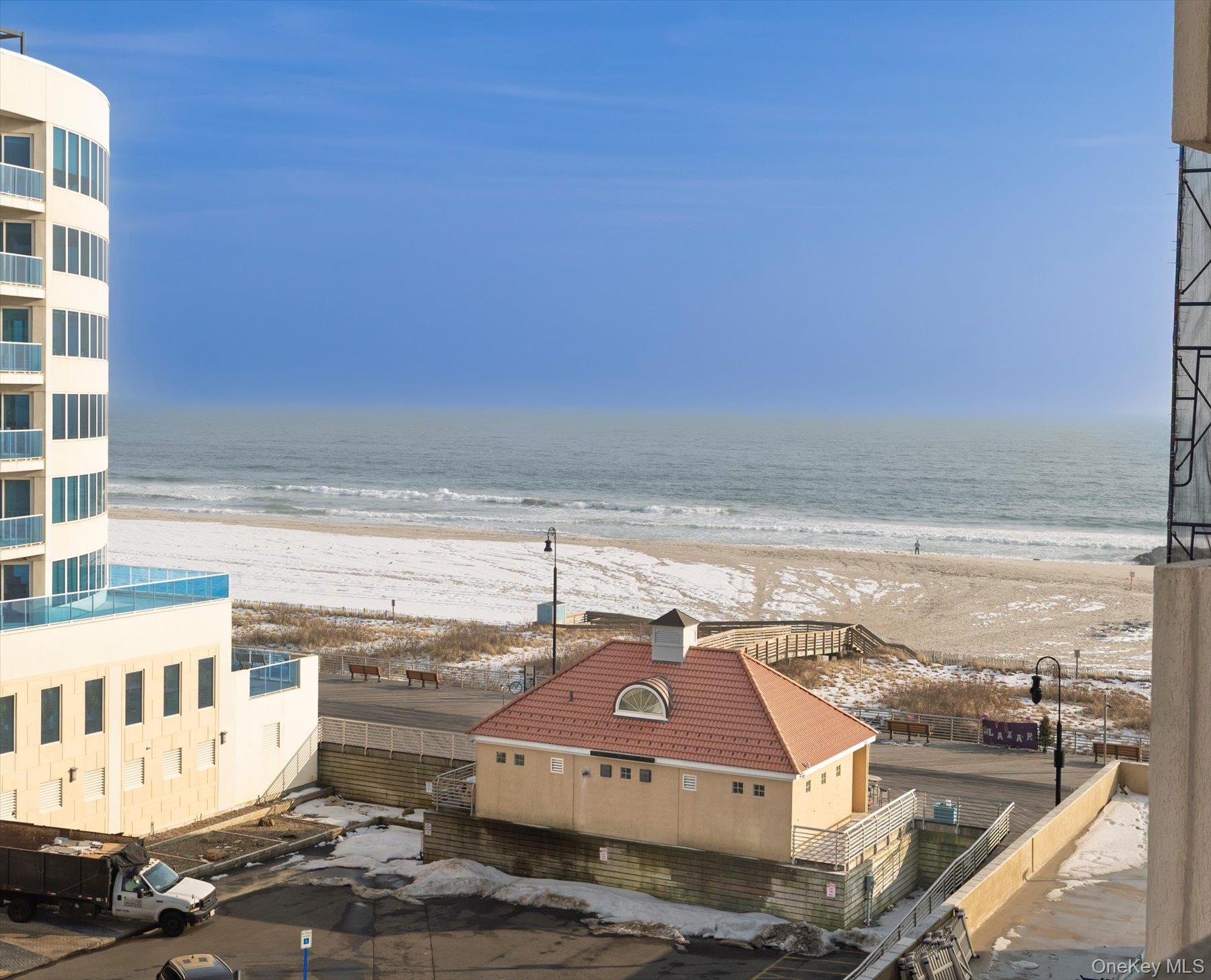 360 Shore Road, Unit 6L & 6M Long Beach, NY 11561 - Photo 22 of 28 a view of a building with an ocean