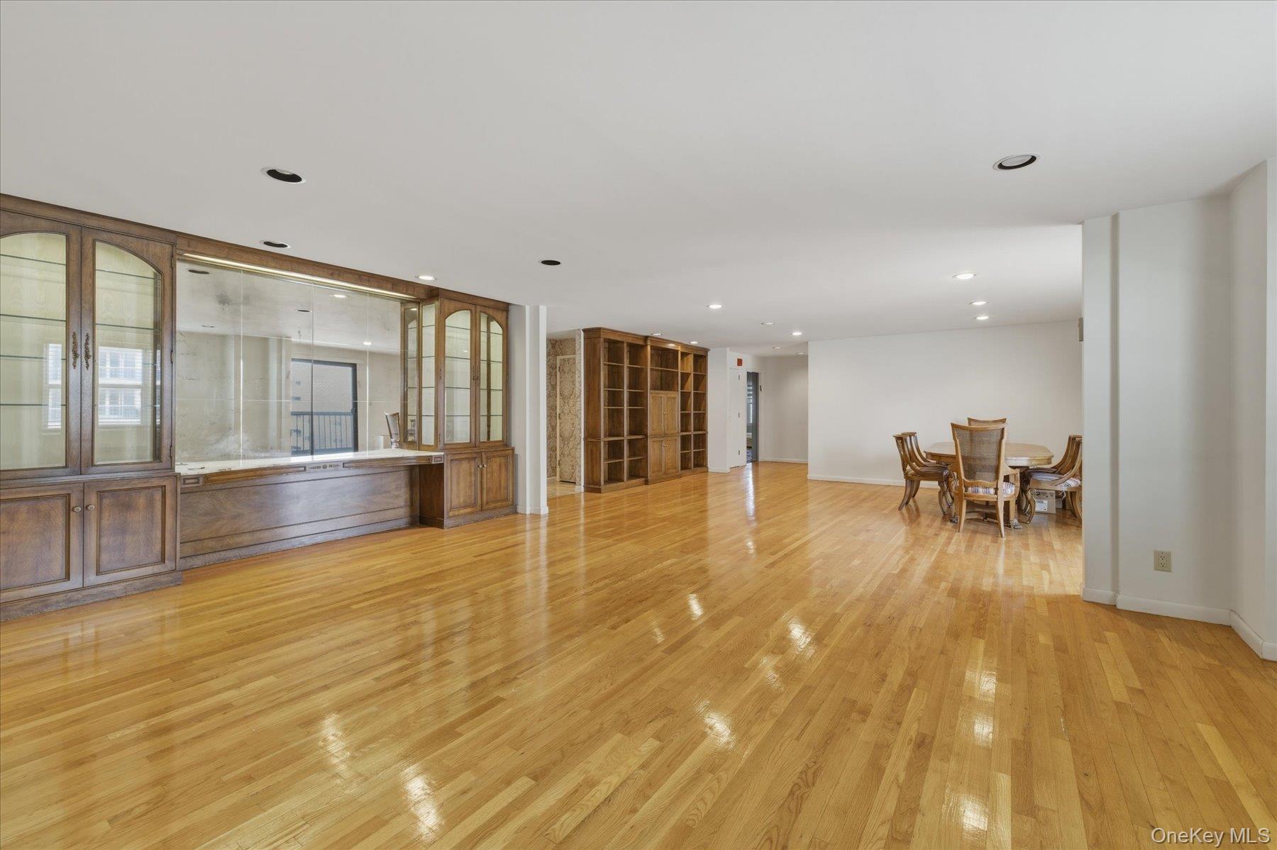 360 Shore Road, Unit 6L & 6M Long Beach, NY 11561 - Photo 8 of 28 a view of dining room with wooden floor