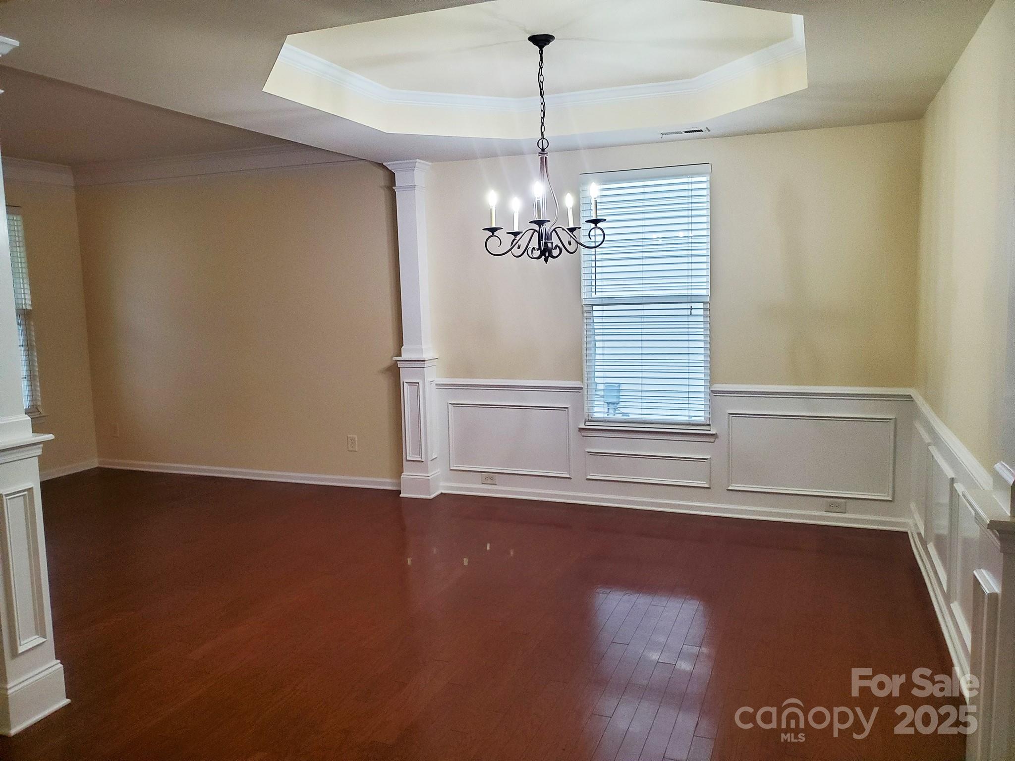 13008 Rothe House Road Charlotte, NC 28273 - Photo 7 of 23 a view of livingroom with hardwood floor and window