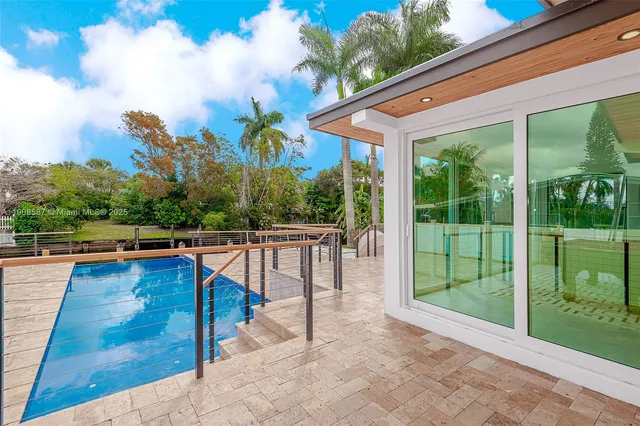 a view of outdoor space yard and swimming pool