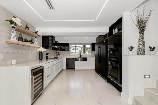 a bedroom with a bed and glass window