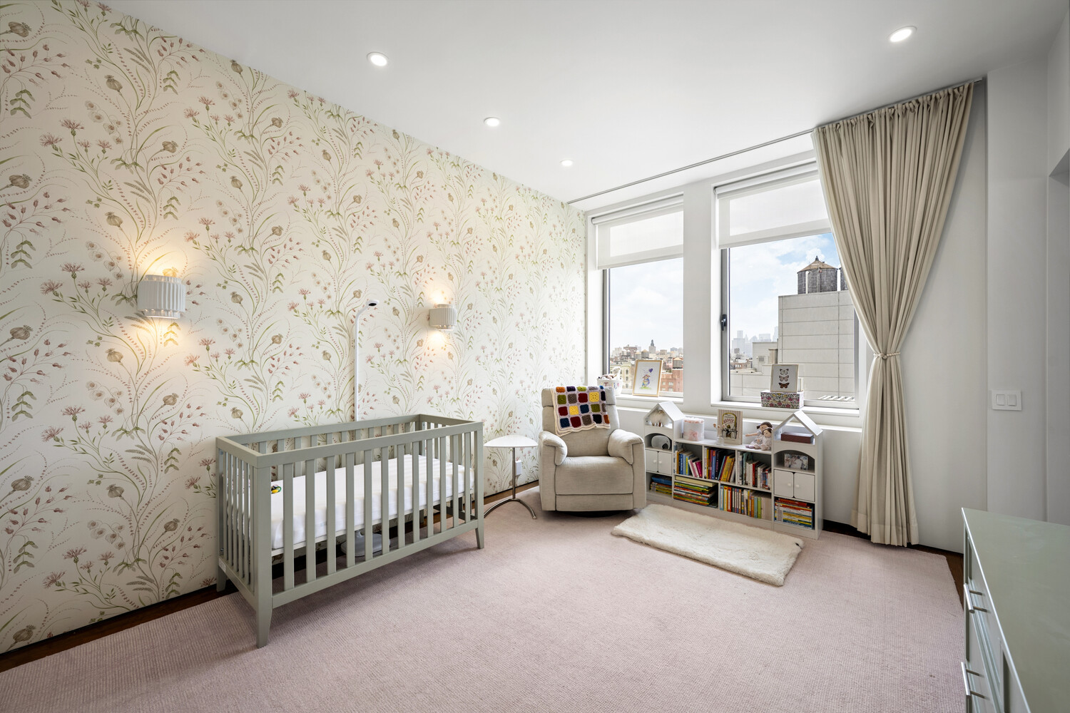252 7th Avenue, Unit 15N Manhattan, NY 10001 - Photo 12 of 15 a living room with furniture and a window