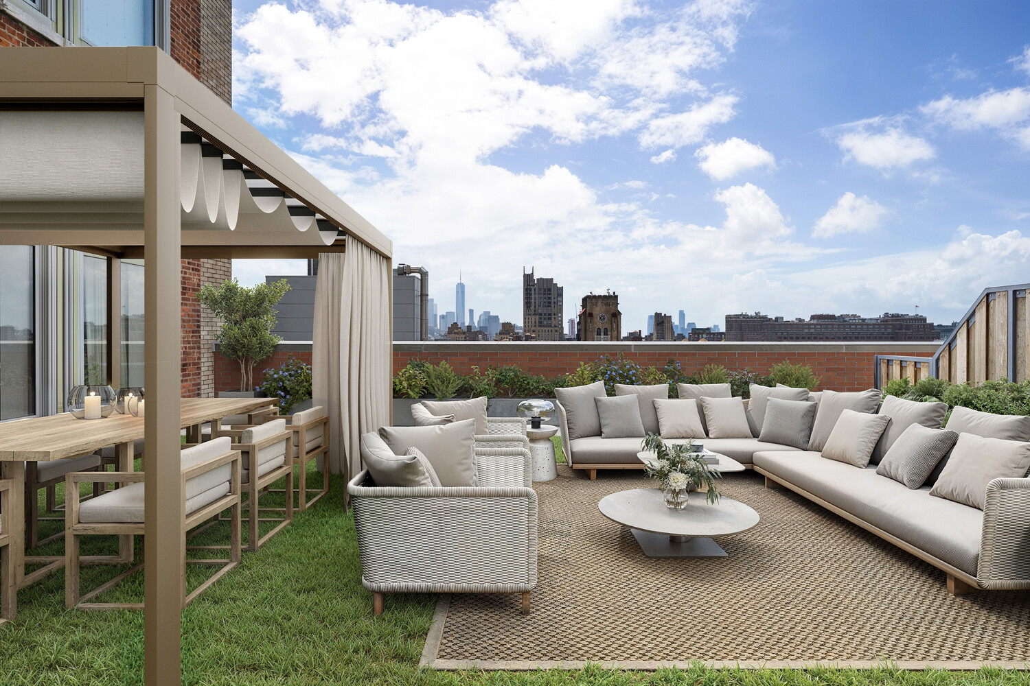 a roof deck with couches and potted plants