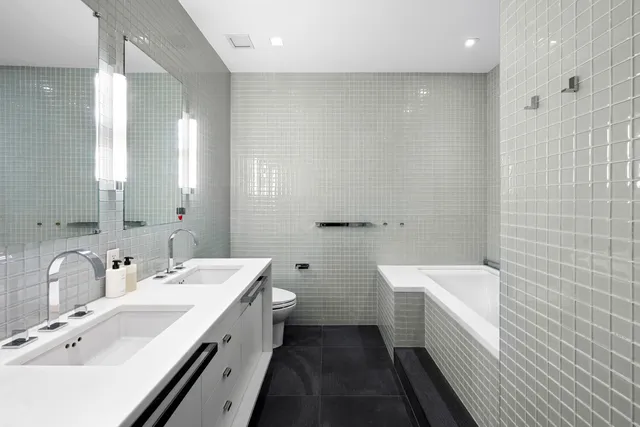 a view of a kitchen with furniture and window