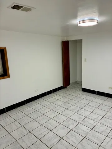 a bathroom with a toilet a sink and bathtub