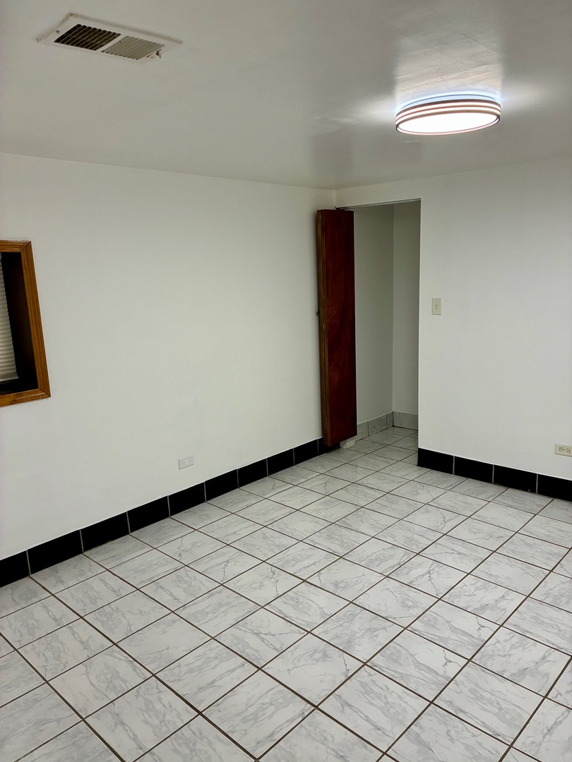 1111 North Leclaire Avenue, Unit B Chicago, IL 60651 - Photo 10 of 11 a view of empty room