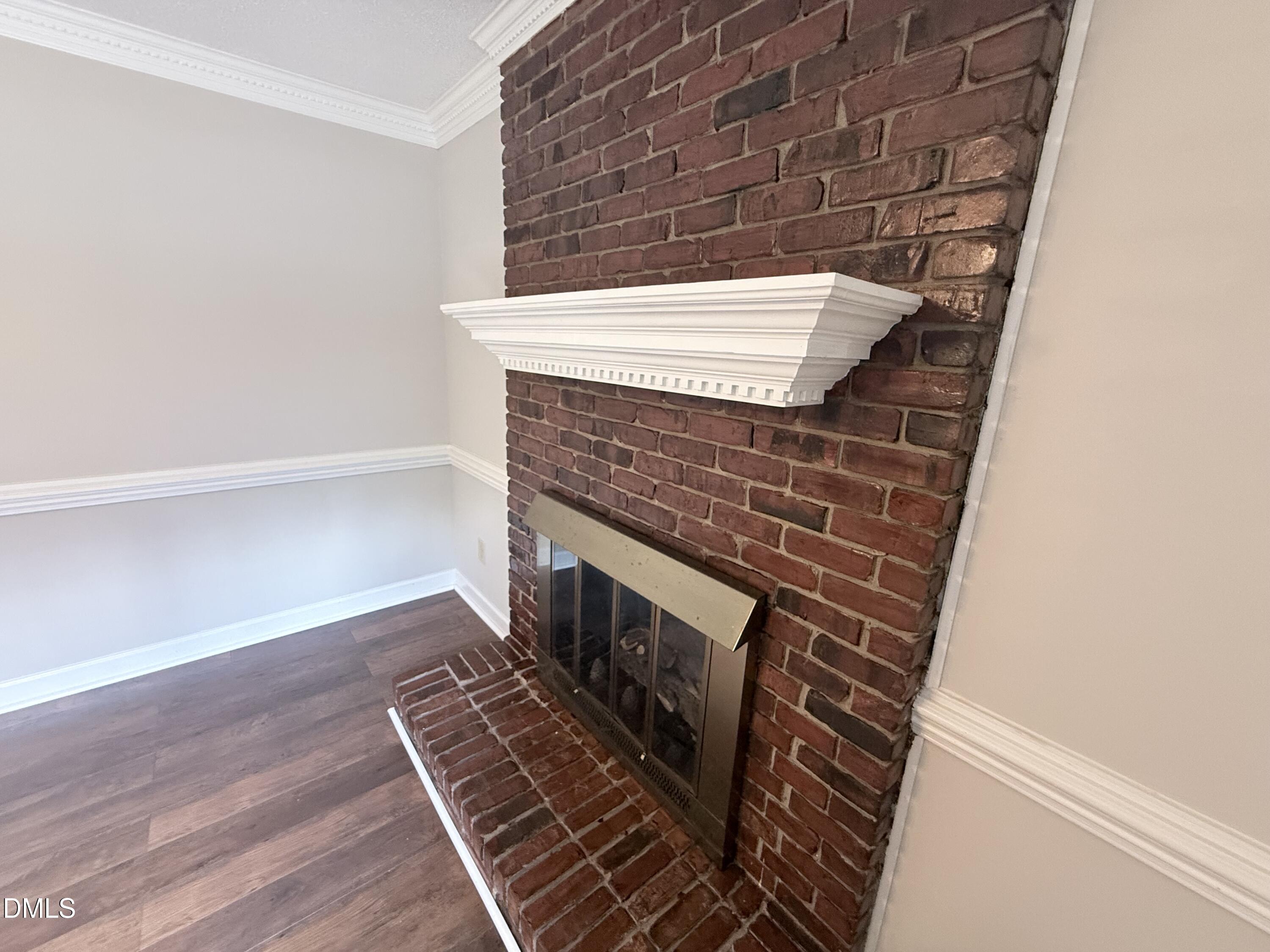 2900 Broadlands Drive Raleigh, NC 27604 - Photo 24 of 60 a view of an empty room with wooden floor