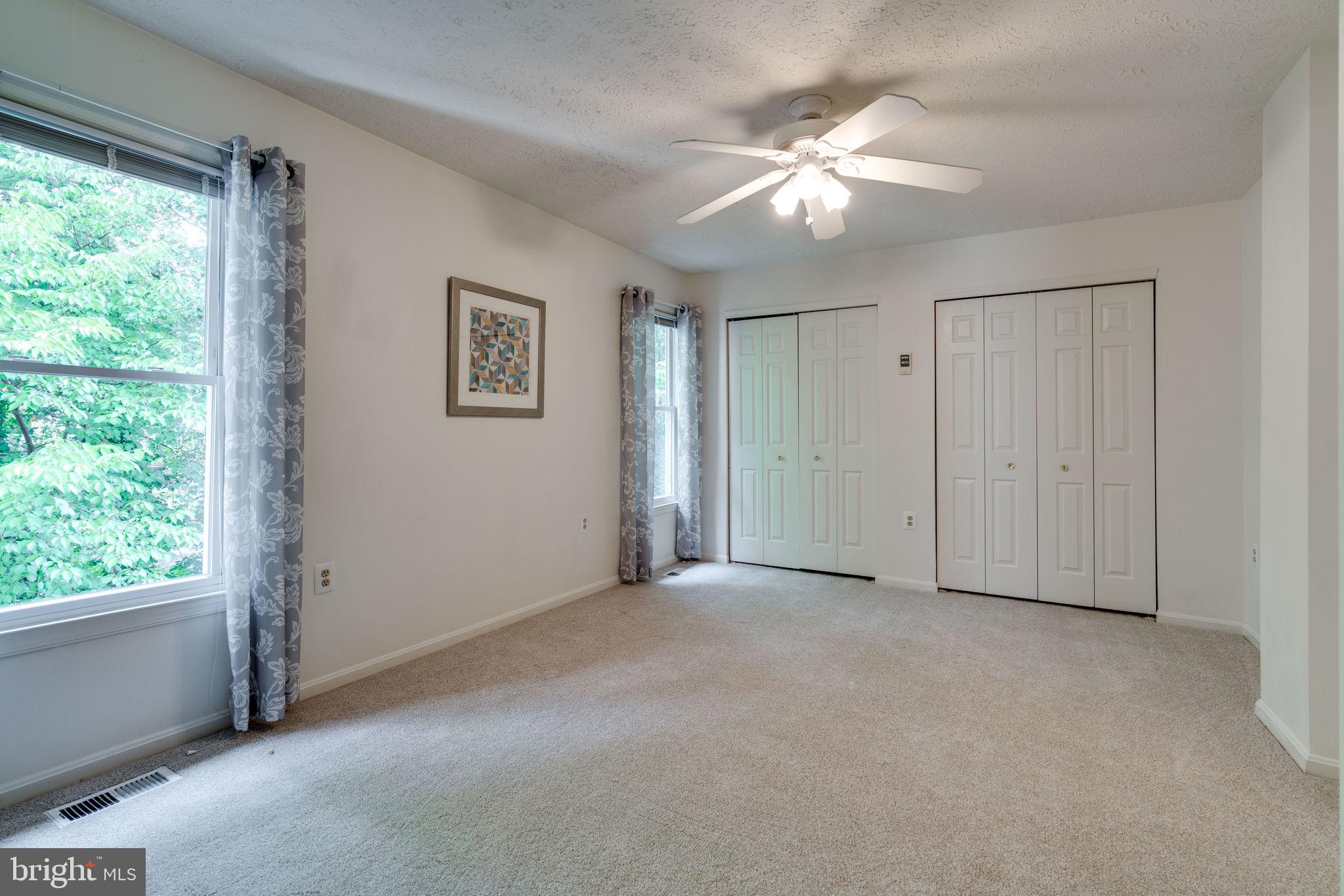 7371 Stream Way Springfield, VA 22152 - Photo 15 of 58 Master bedroom overlooking trees