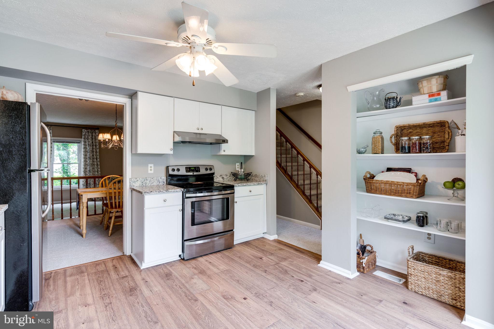 7371 Stream Way Springfield, VA 22152 - Photo 4 of 58 New wide plank flooring