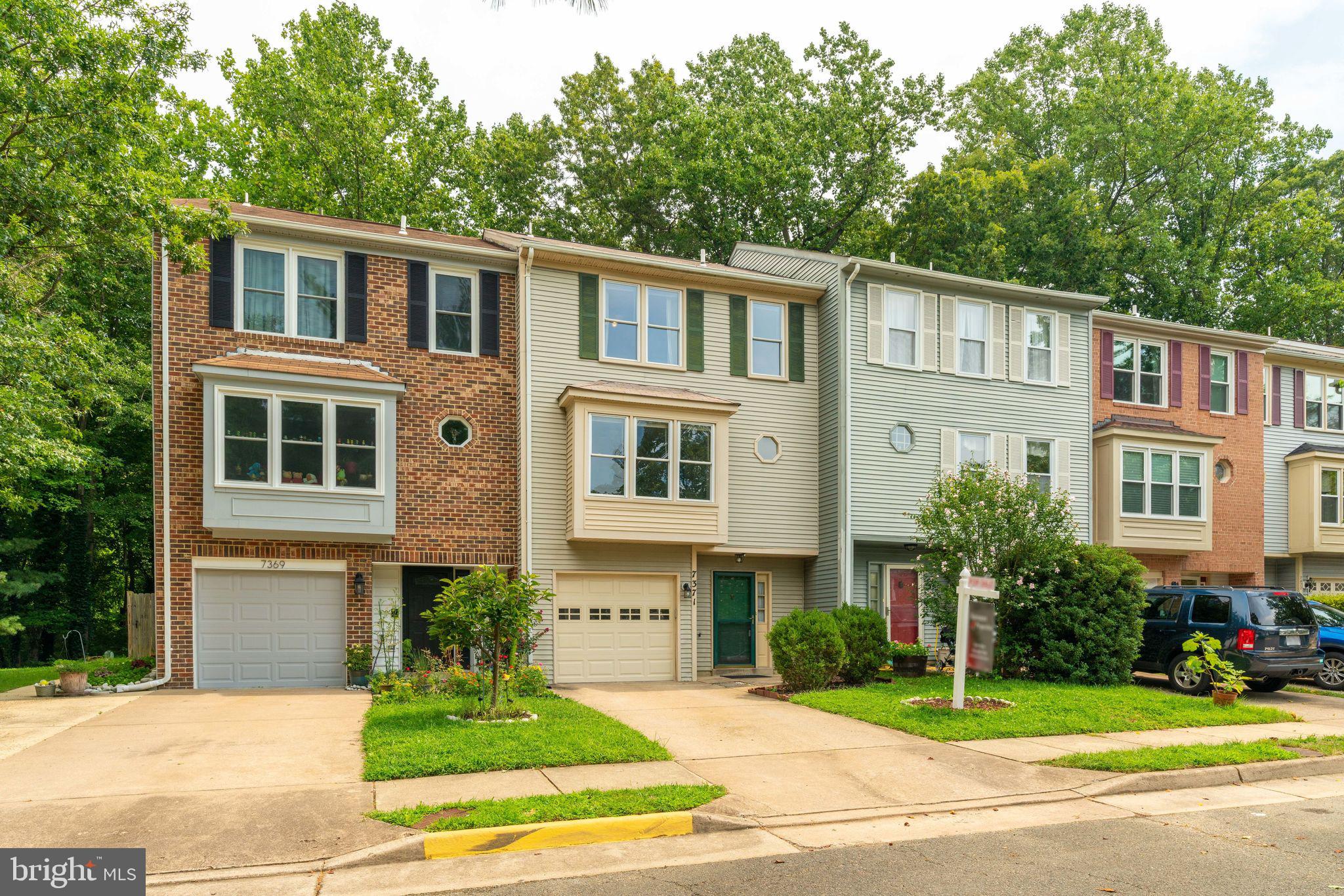 7371 Stream Way Springfield, VA 22152 - Photo 58 of 58 One car garage and extra parking in driveway