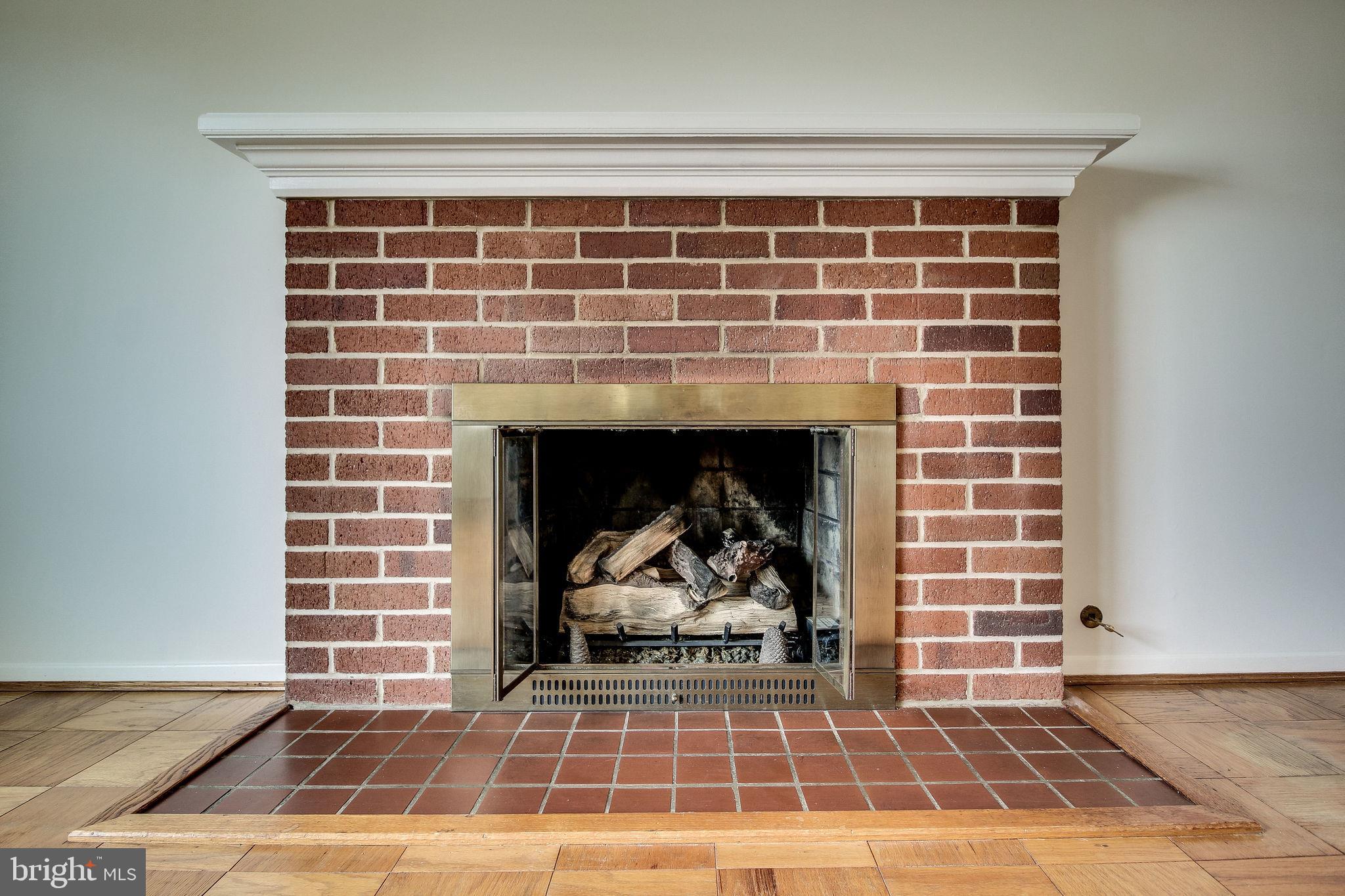 7421 Grace Street Springfield, VA 22150 - Photo 17 of 32 COZY EVENINGS BY NATURAL GAS/WOOD BURNING FIRE