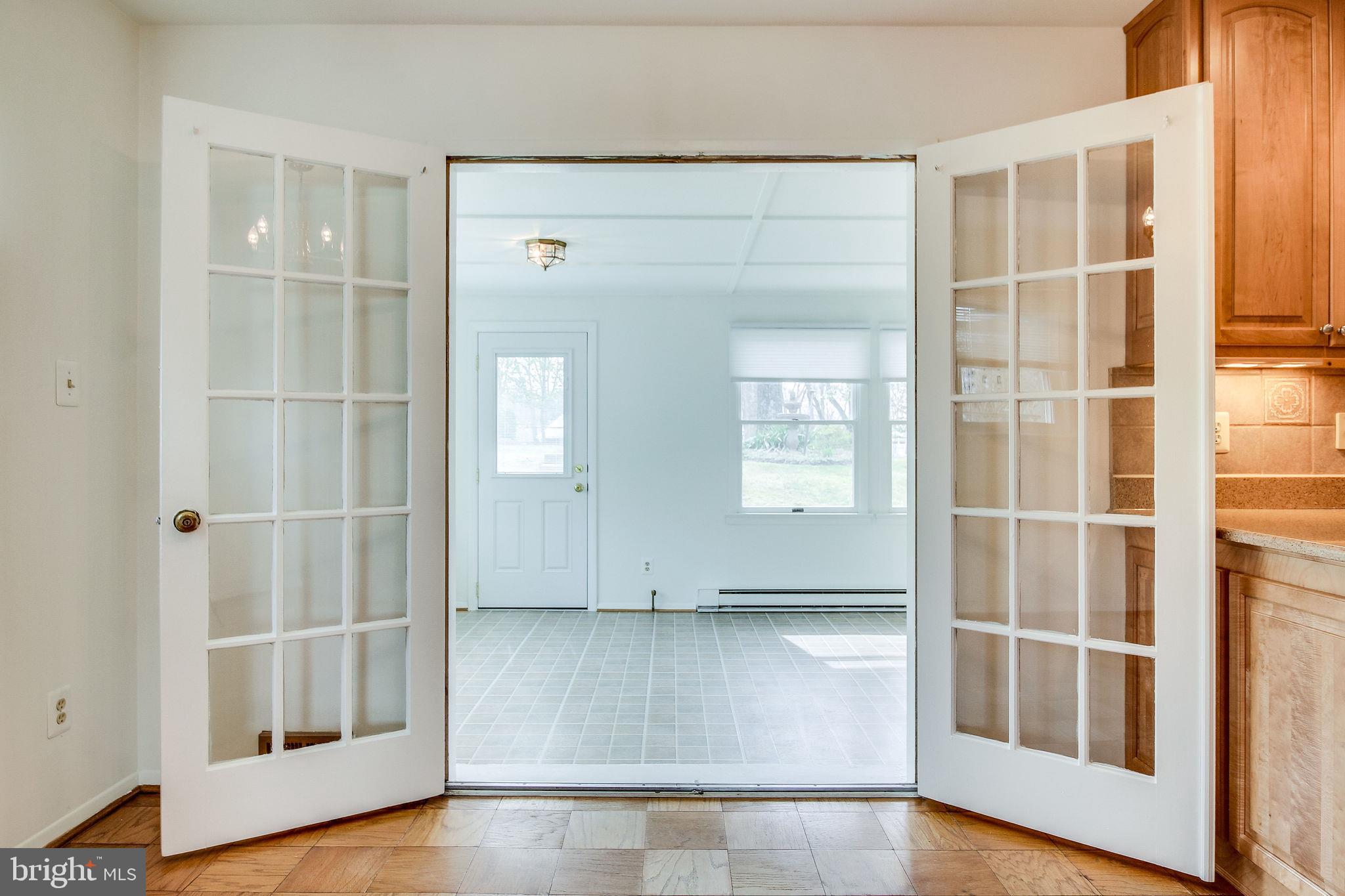 7421 Grace Street Springfield, VA 22150 - Photo 23 of 32 BEAUTIFUL CRAFTED FRENCH DOORS TO ALL SEASONS ROOM