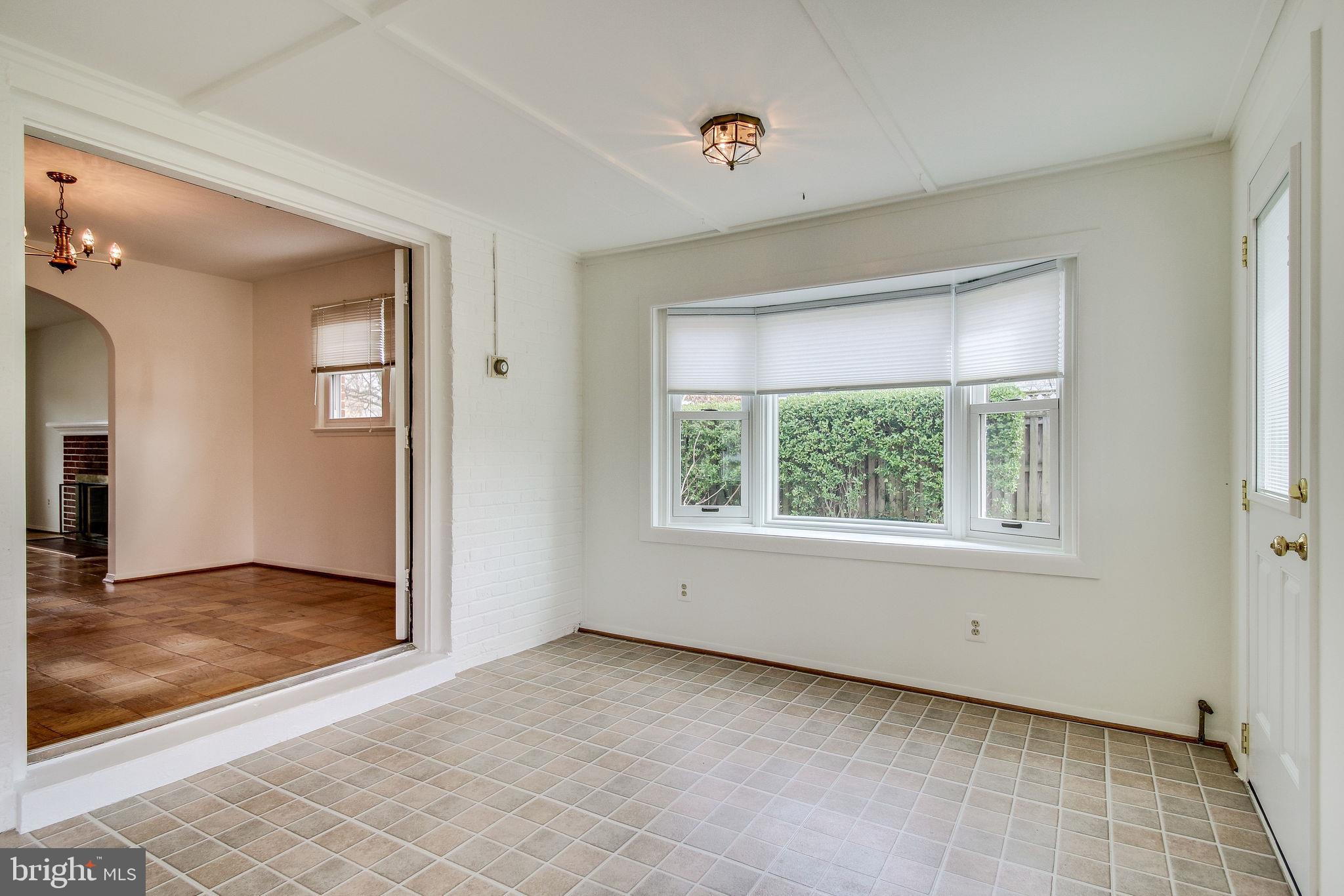 7421 Grace Street Springfield, VA 22150 - Photo 24 of 32 SUNROOM( 21 X 11) LARGE WINDOWS CUSTOM SHADES