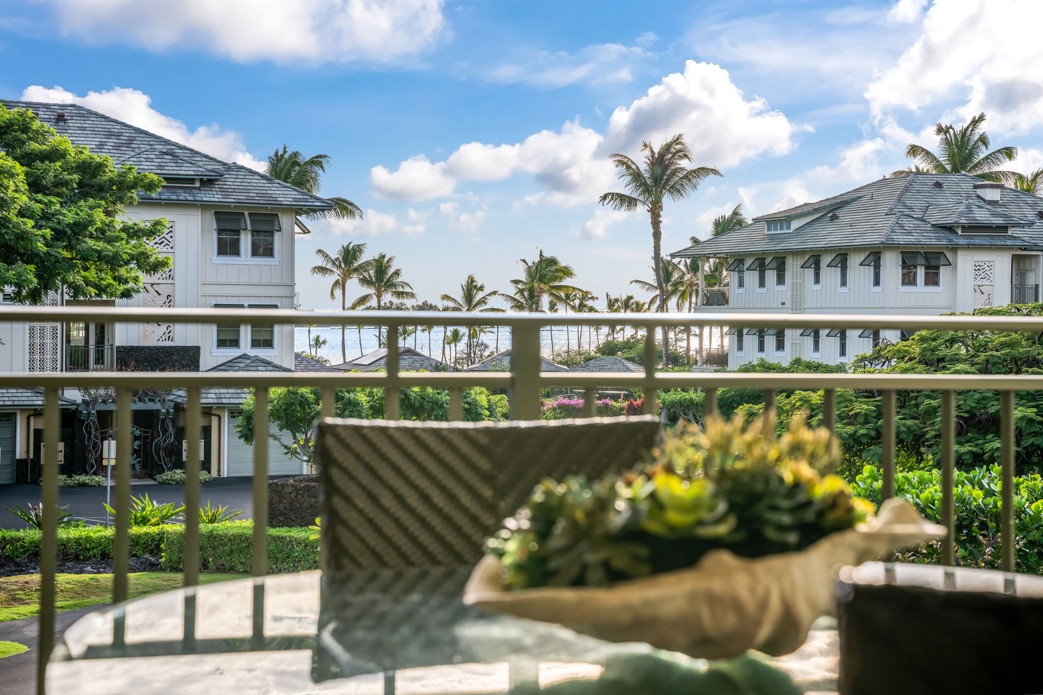 69-1000 Kolea Kai Circle, Unit 14H Waikoloa, HI 96738 - Photo 23 of 29 a balcony with outdoor seating