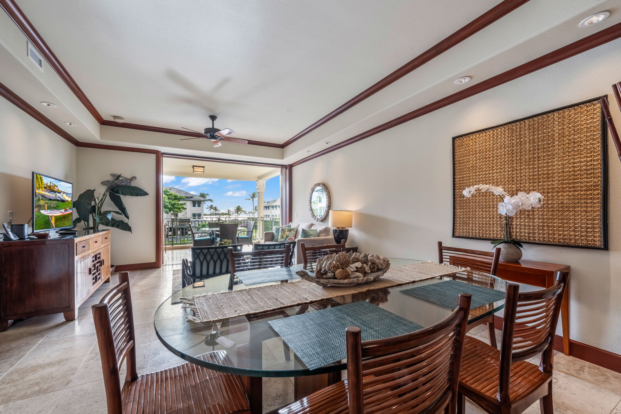 69-1000 Kolea Kai Circle, Unit 14H Waikoloa, HI 96738 - Photo 7 of 29 a view of a dining room with furniture large window and outside view