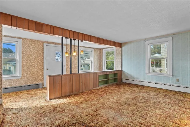 an empty room with windows