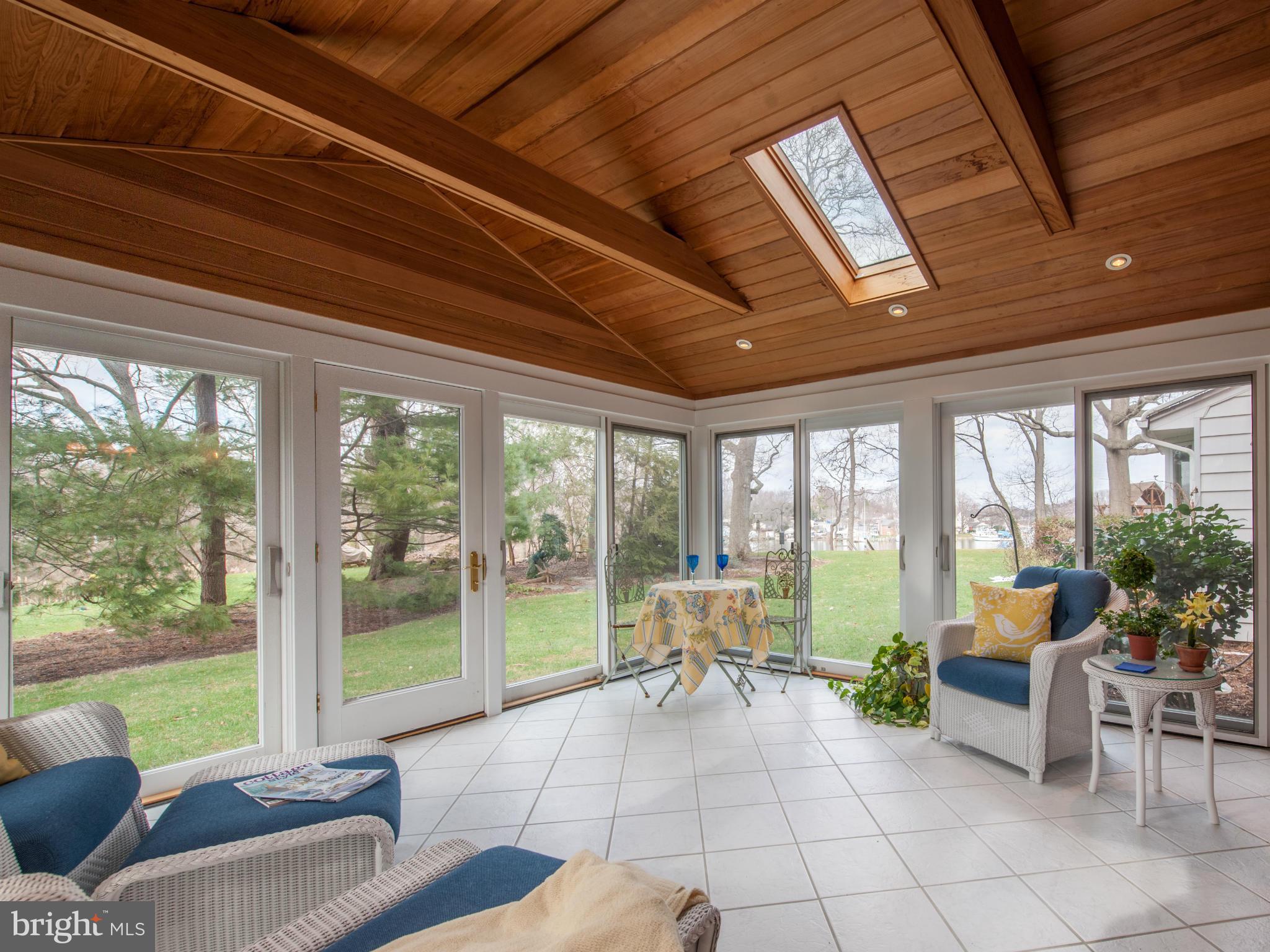257 Providence Road Annapolis, MD 21409 - Photo 12 of 30 a living room with furniture and large windows