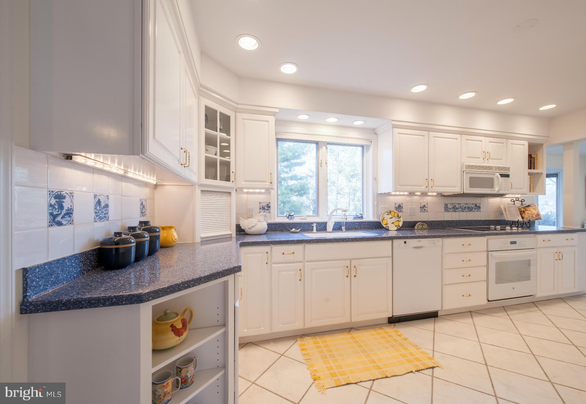 257 Providence Road Annapolis, MD 21409 - Photo 15 of 30 a kitchen with stainless steel appliances granite countertop a sink and cabinets