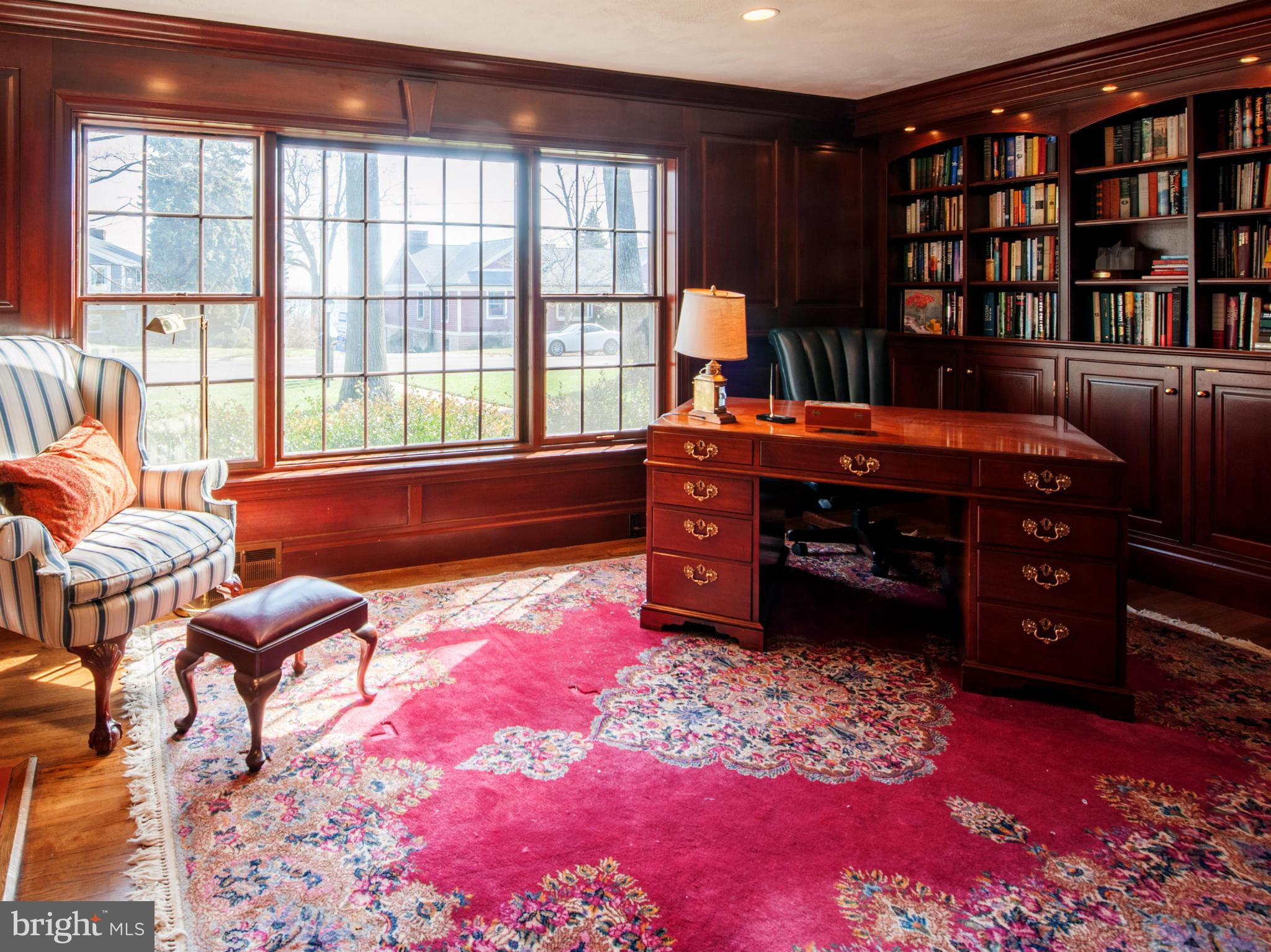 257 Providence Road Annapolis, MD 21409 - Photo 17 of 30 a room with furniture and a book shelf