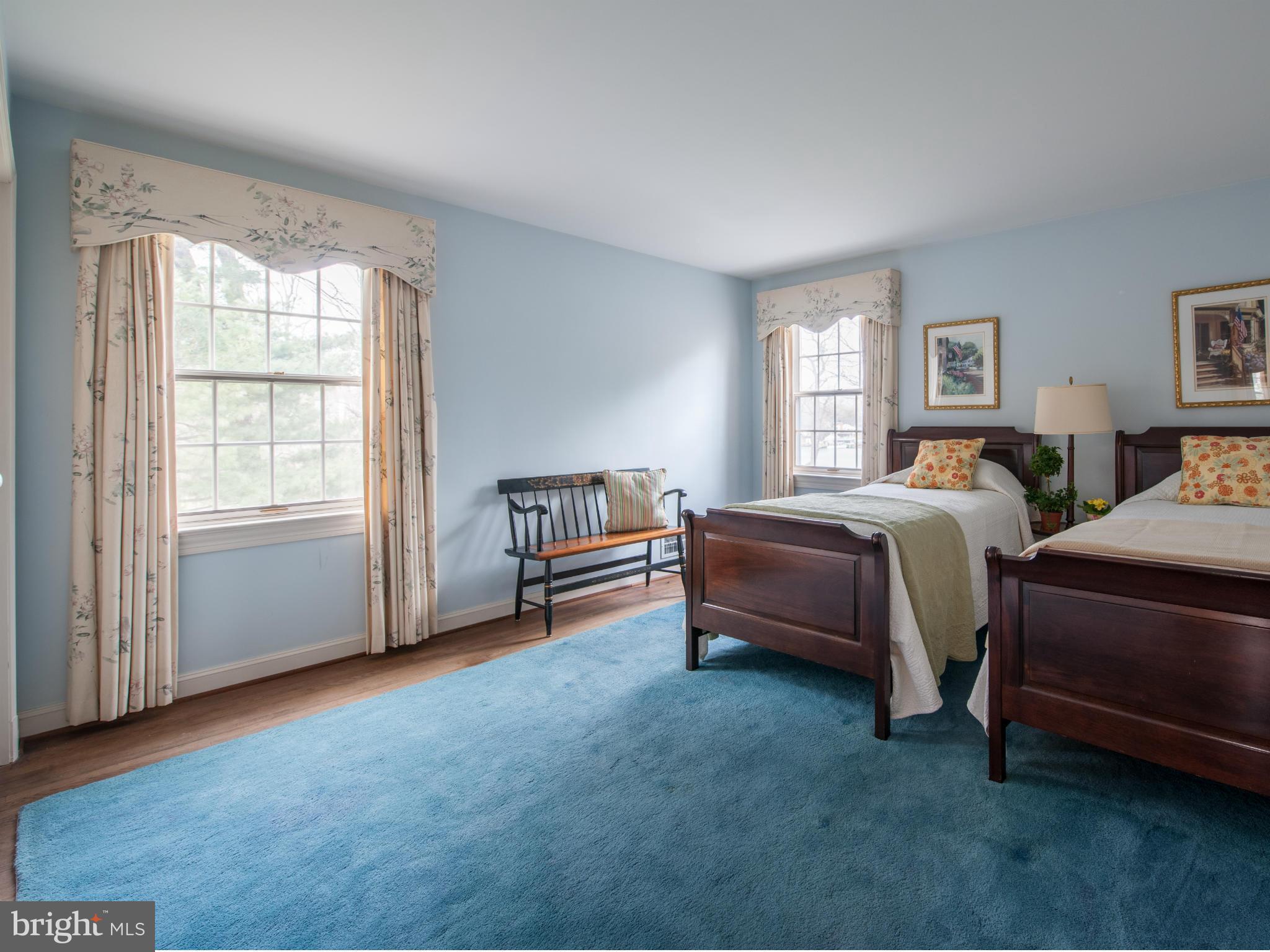 257 Providence Road Annapolis, MD 21409 - Photo 22 of 30 a spacious bedroom with a bed and a window