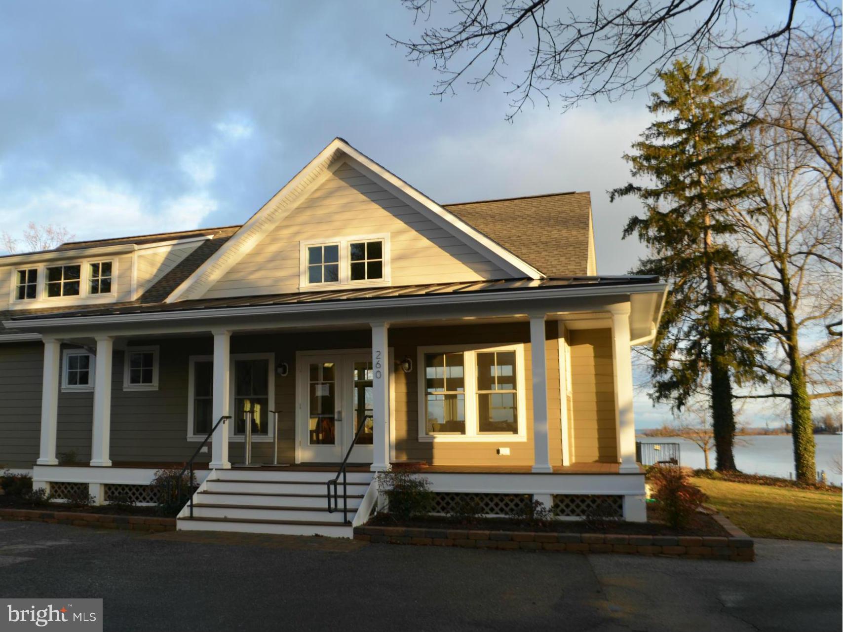 257 Providence Road Annapolis, MD 21409 - Photo 26 of 30 a front view of a house with a yard