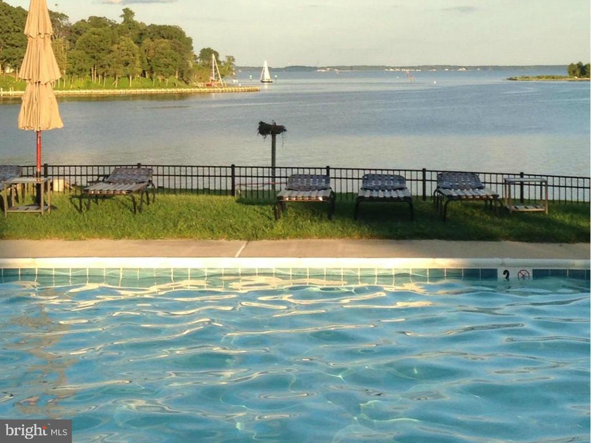 257 Providence Road Annapolis, MD 21409 - Photo 29 of 30 a view of a lake with a large bridge