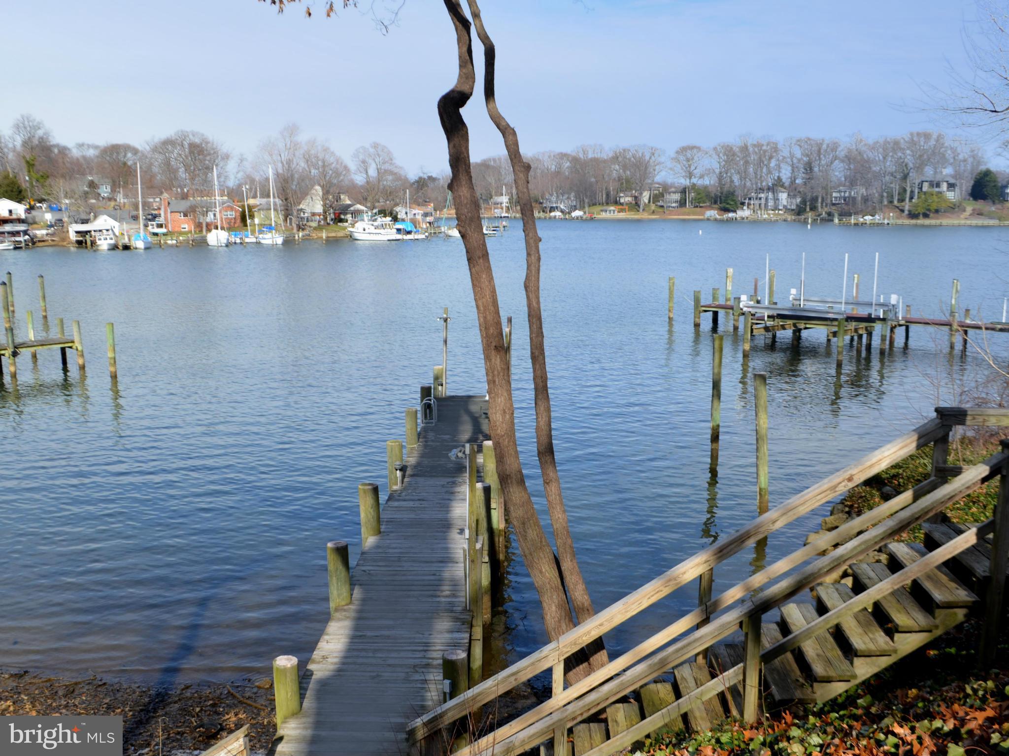 257 Providence Road Annapolis, MD 21409 - Photo 5 of 30 a view of a lake with a bridge