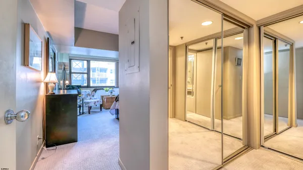 a view of livingroom with furniture and floor to ceiling window