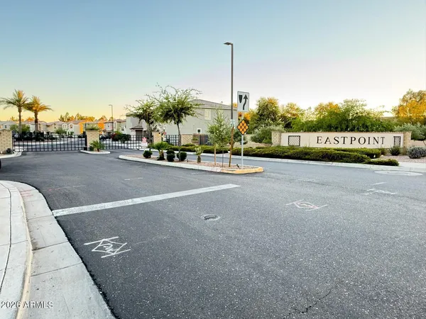 a view of a street with a cars park