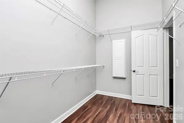 a view of a room with racks on the wall