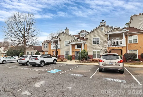 a view of street with parked cars