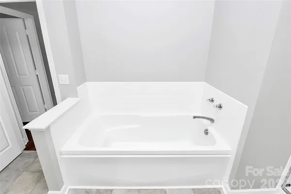 a bathroom with a bathtub