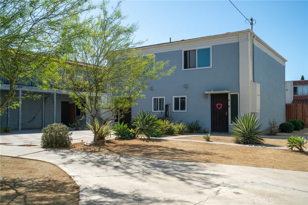 13392 Magnolia Street Garden Grove, CA 92844 - Photo 6 of 15 a view of a house with a yard