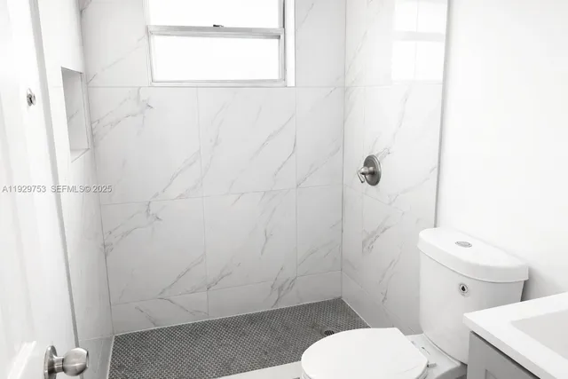 a view of house with yard