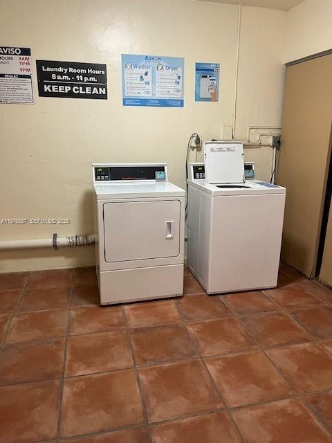 9493 Southwest 76th Street, Unit L4 Miami, FL 33173 - Photo 25 of 33 a utility room with a washer and dryer