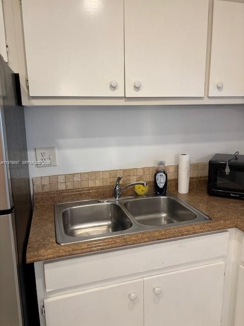 9493 Southwest 76th Street, Unit L4 Miami, FL 33173 - Photo 5 of 33 a close view of sink and tap