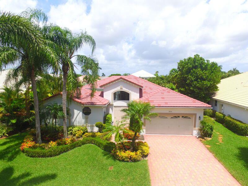 7674 La Corniche Circle Boca Raton, FL 33433 - Photo 1 of 26 front of house