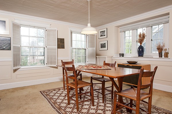 18 Fredana Road Newton, MA 02468 - Photo 3 of 7 a view of a dining room and livingroom with furniture wooden floor and a rug