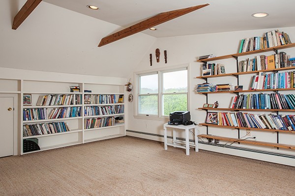 18 Fredana Road Newton, MA 02468 - Photo 7 of 7 a reading room with furniture and book shelf