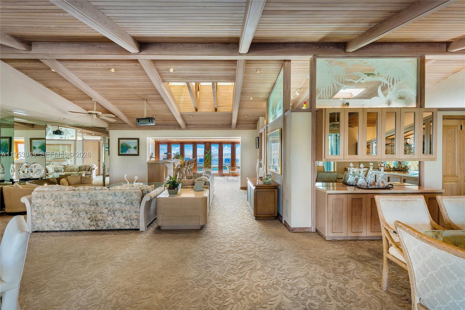 720 Lugo Avenue Coral Gables, FL 33156 - Photo 37 of 71 a living room with furniture and a window