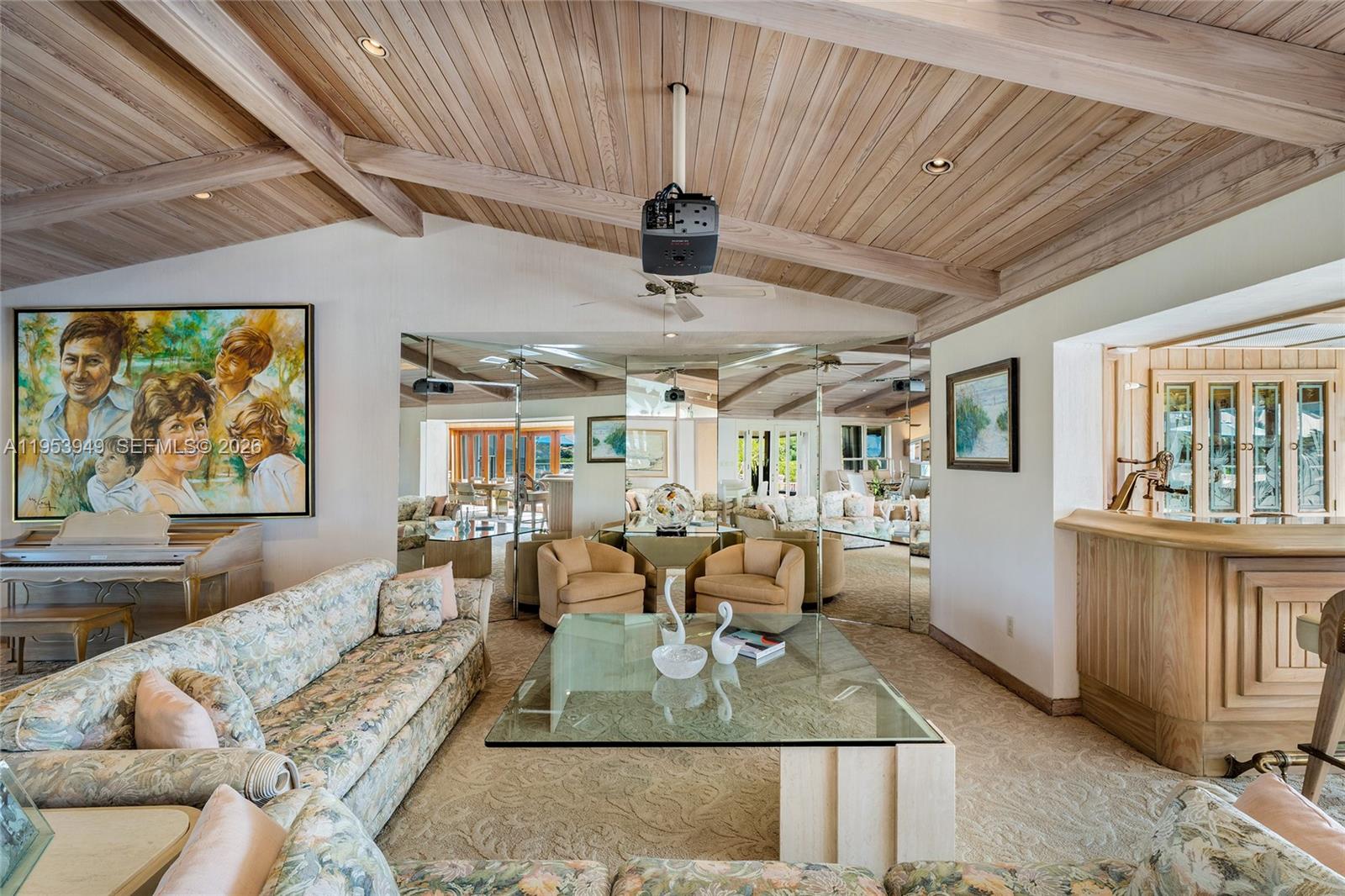 720 Lugo Avenue Coral Gables, FL 33156 - Photo 42 of 71 a living room with furniture and a wooden floor