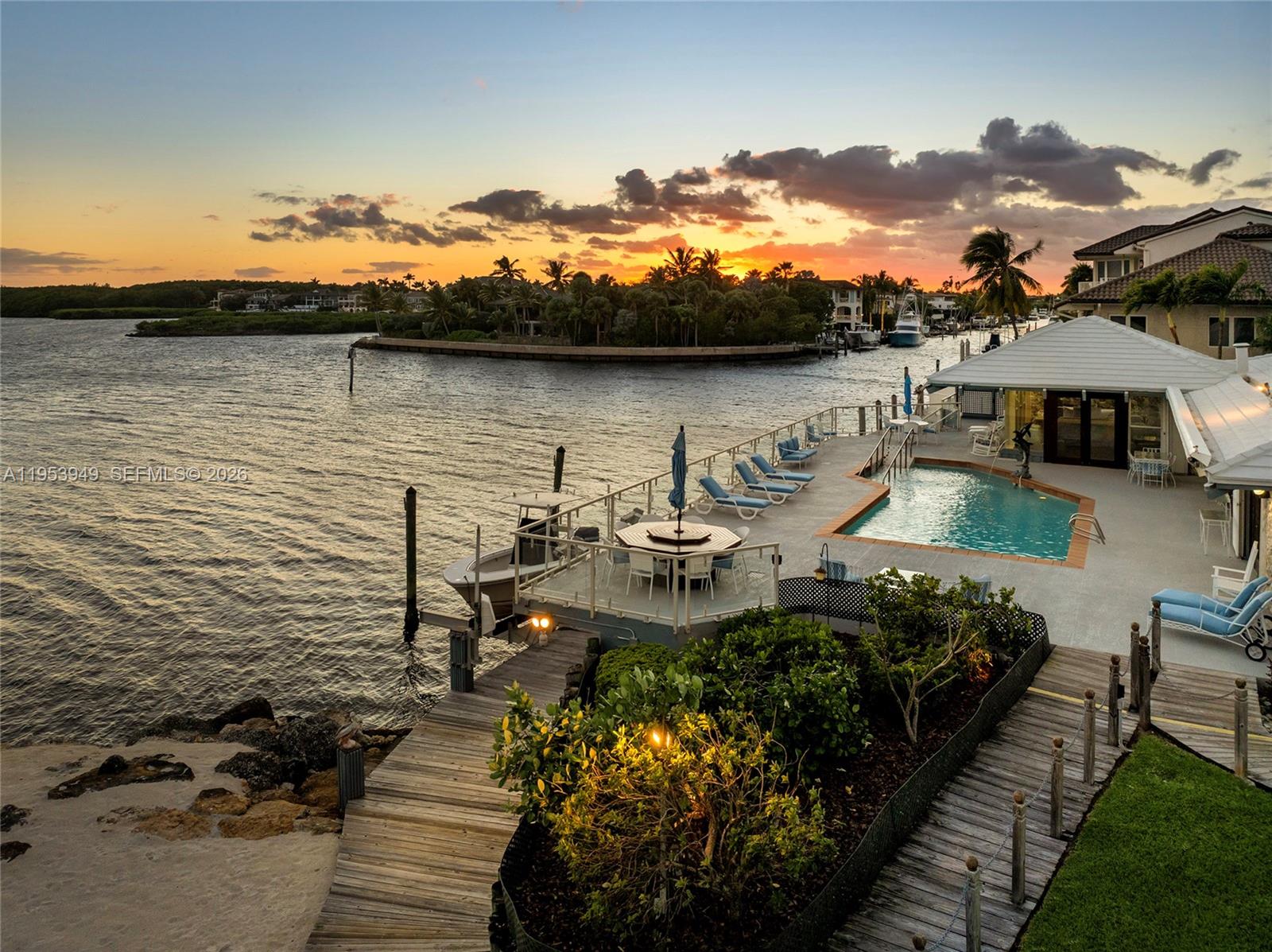 720 Lugo Avenue Coral Gables, FL 33156 - Photo 56 of 71 a view of a lake with houses