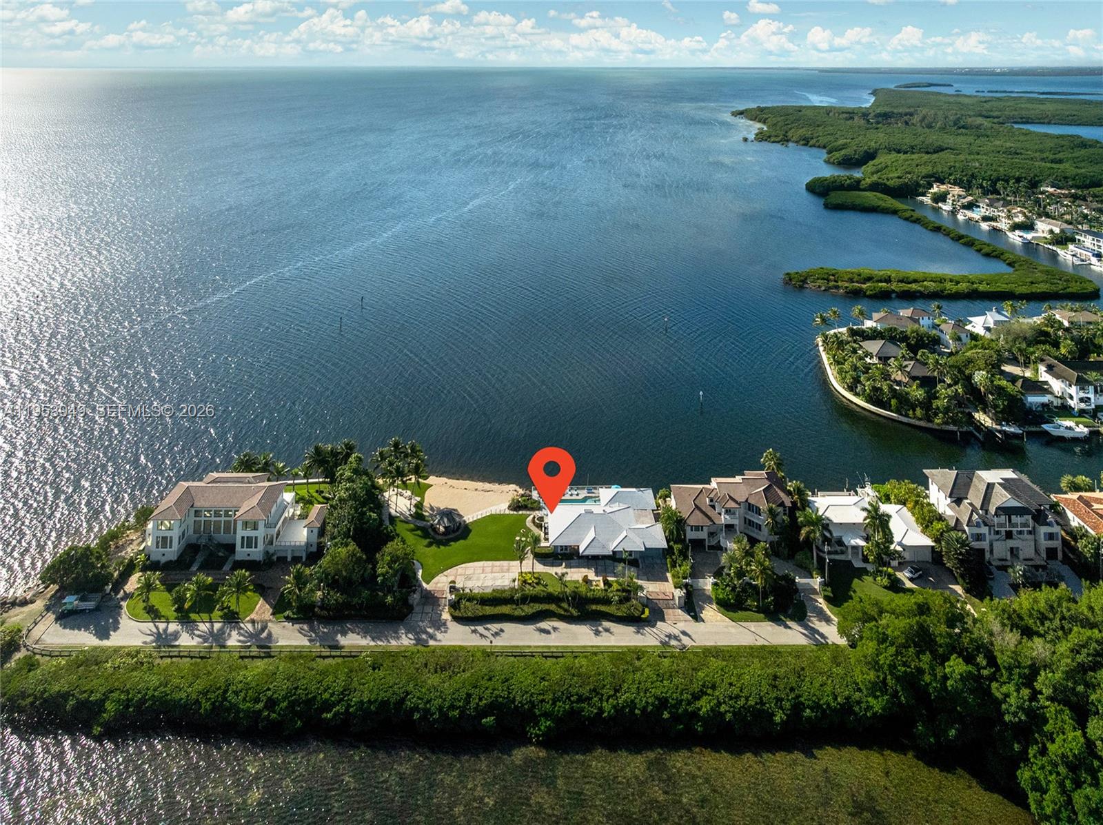 720 Lugo Avenue Coral Gables, FL 33156 - Photo 64 of 71 a vase of flowers sitting on a table