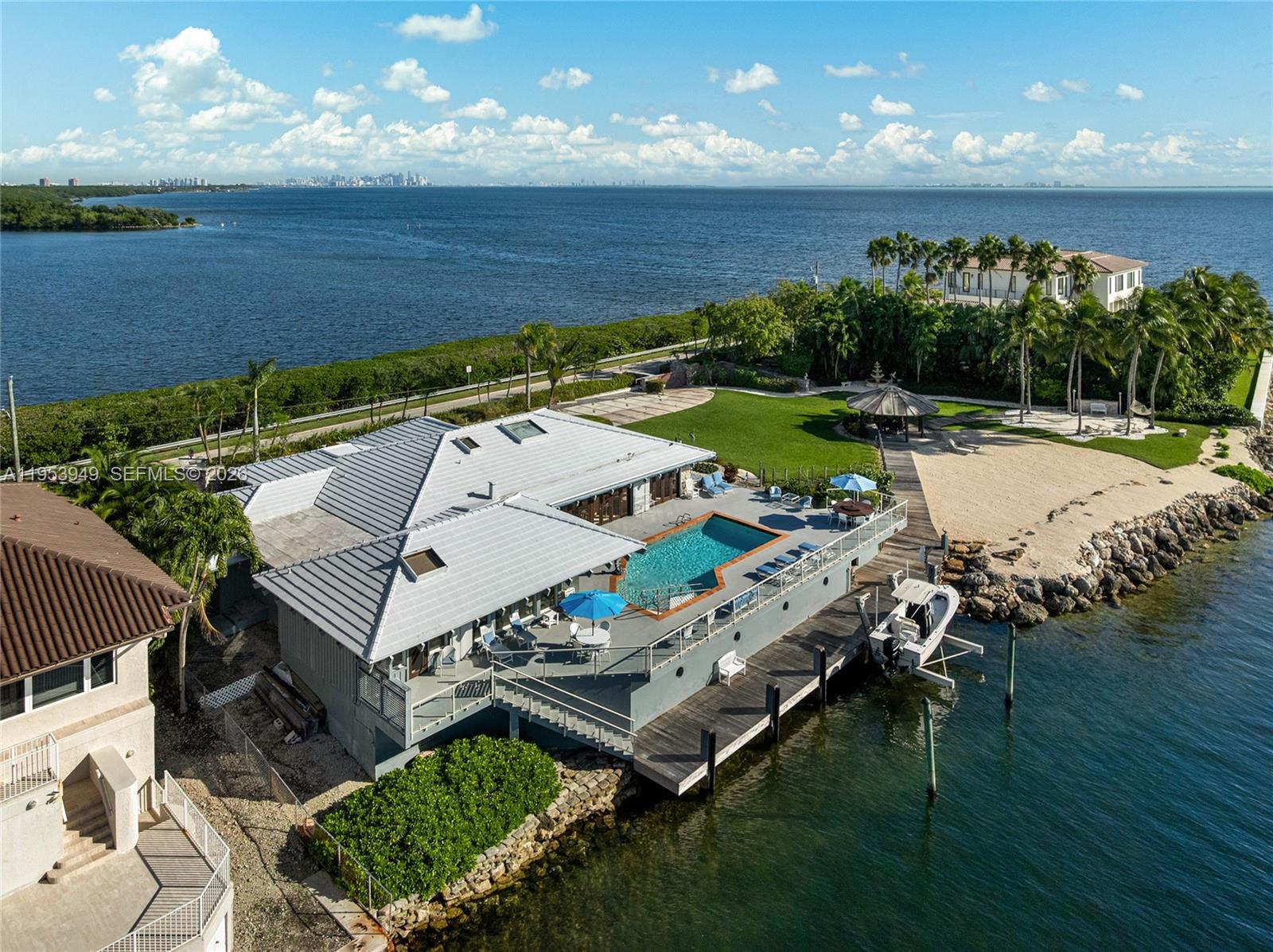 720 Lugo Avenue Coral Gables, FL 33156 - Photo 7 of 71 an aerial view of a house with a ocean view