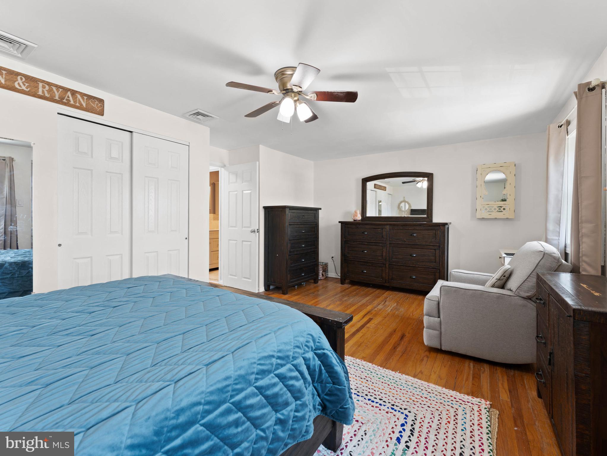 10839 Rayland Road Philadelphia, PA 19154 - Photo 14 of 30 a bedroom with a bed couches and a flat tv screen