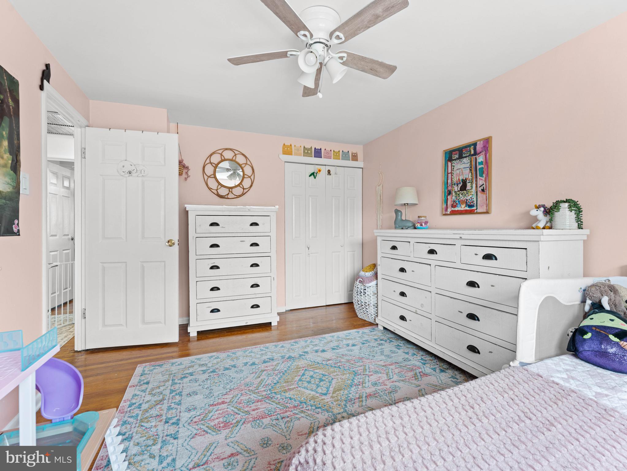 10839 Rayland Road Philadelphia, PA 19154 - Photo 18 of 30 a bedroom with a bed and a dresser