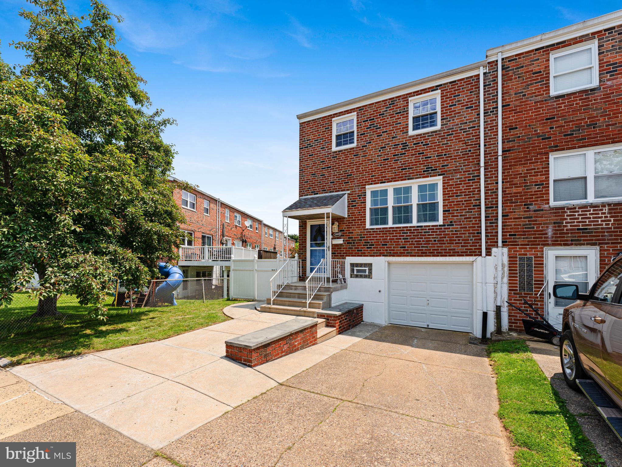 10839 Rayland Road Philadelphia, PA 19154 - Photo 2 of 30 a front view of a house with a yard
