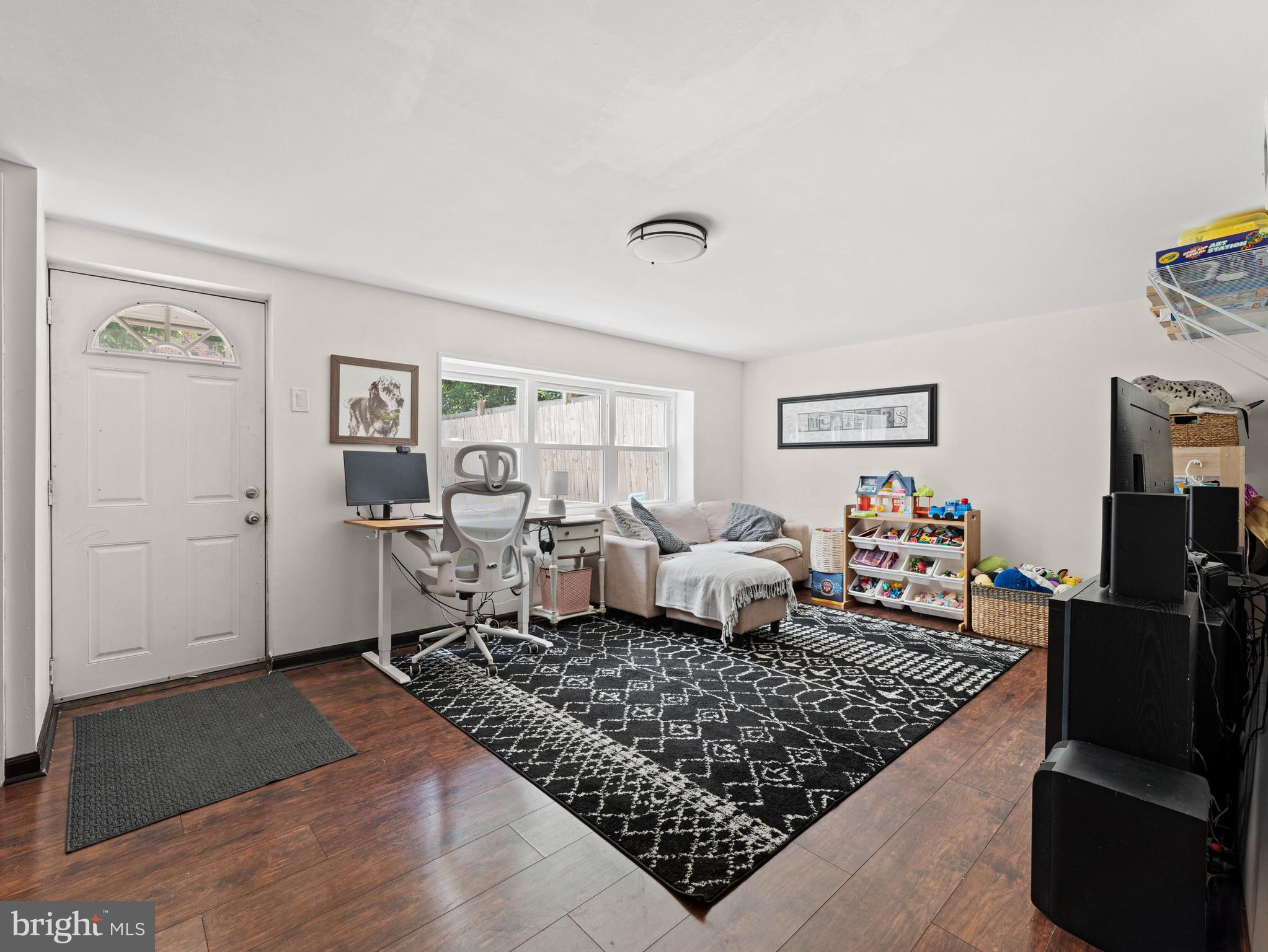 10839 Rayland Road Philadelphia, PA 19154 - Photo 23 of 30 a living room with furniture rug and a table