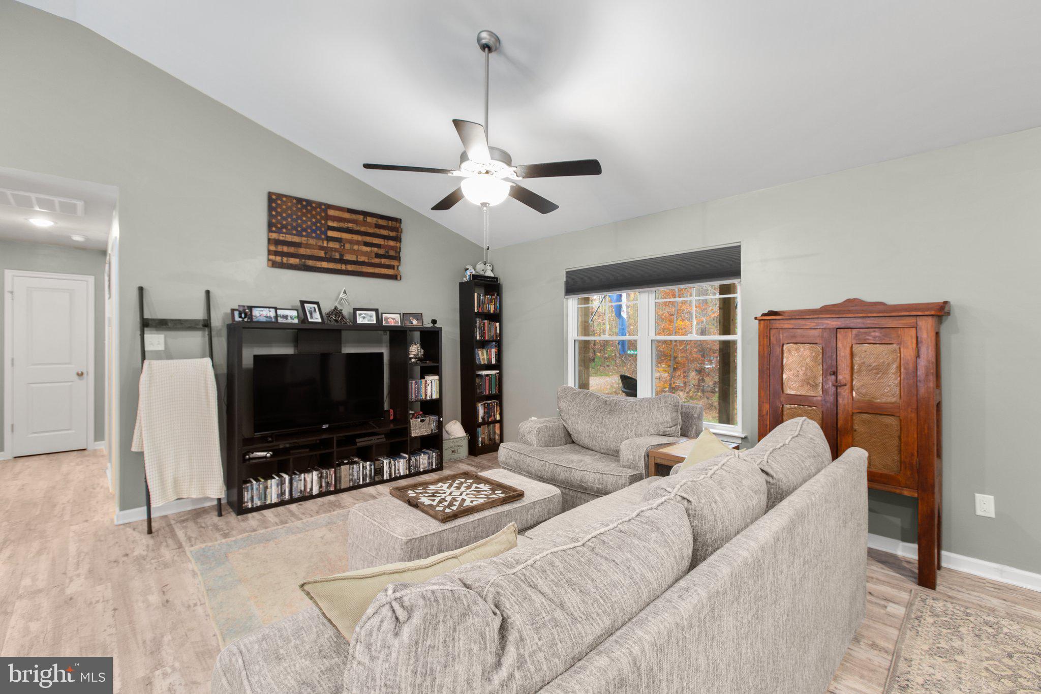 356 Greenes Corner Road Bumpass, VA 23024 - Photo 9 of 41 Ceiling fan over family room area